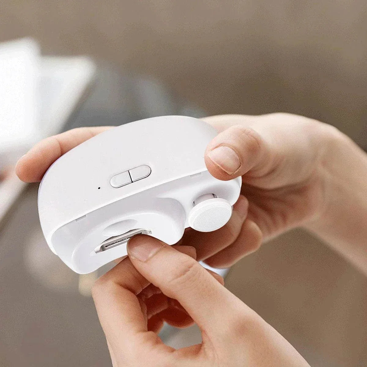 Electric Nail Clipper with ergonomic design and safety guard for effortless nail trimming